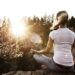 fbaaec woman meditating on mountain